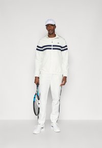 Lacoste TRACKSUIT SET - Tracksuit - flour/navy blue/green